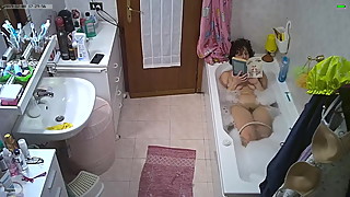 My wife takes a bath and shaves